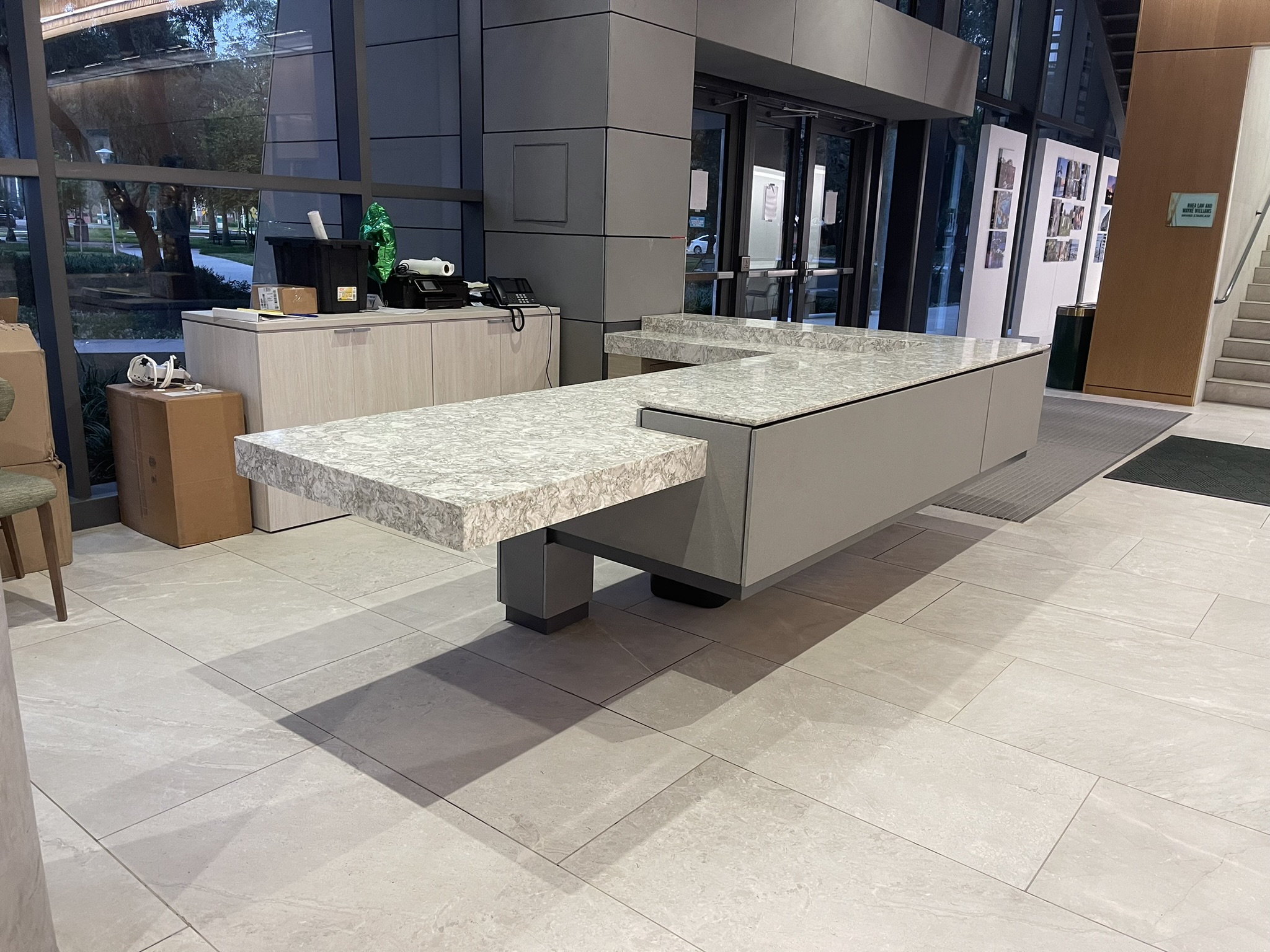 Commercial lobby countertop installation with stone surface
