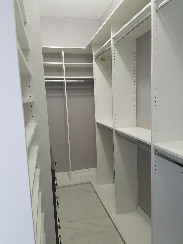 Custom walk-in closet installation by St. Cloud Pro-Services LLC